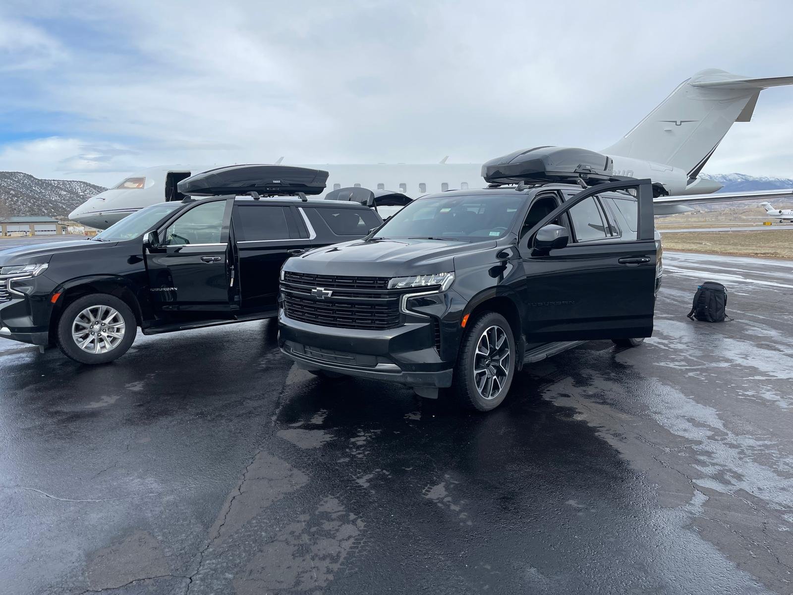 2 Suvs at Eagle Regional FBO / Vail Valley Jet Center for pick up.
